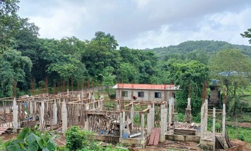 Elevated concrete structure and supporting formwork