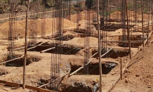Early foundation construction across the site